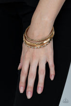 Load image into Gallery viewer, Paparazzi Confidently Curvaceous - Gold Bangle Bracelets
